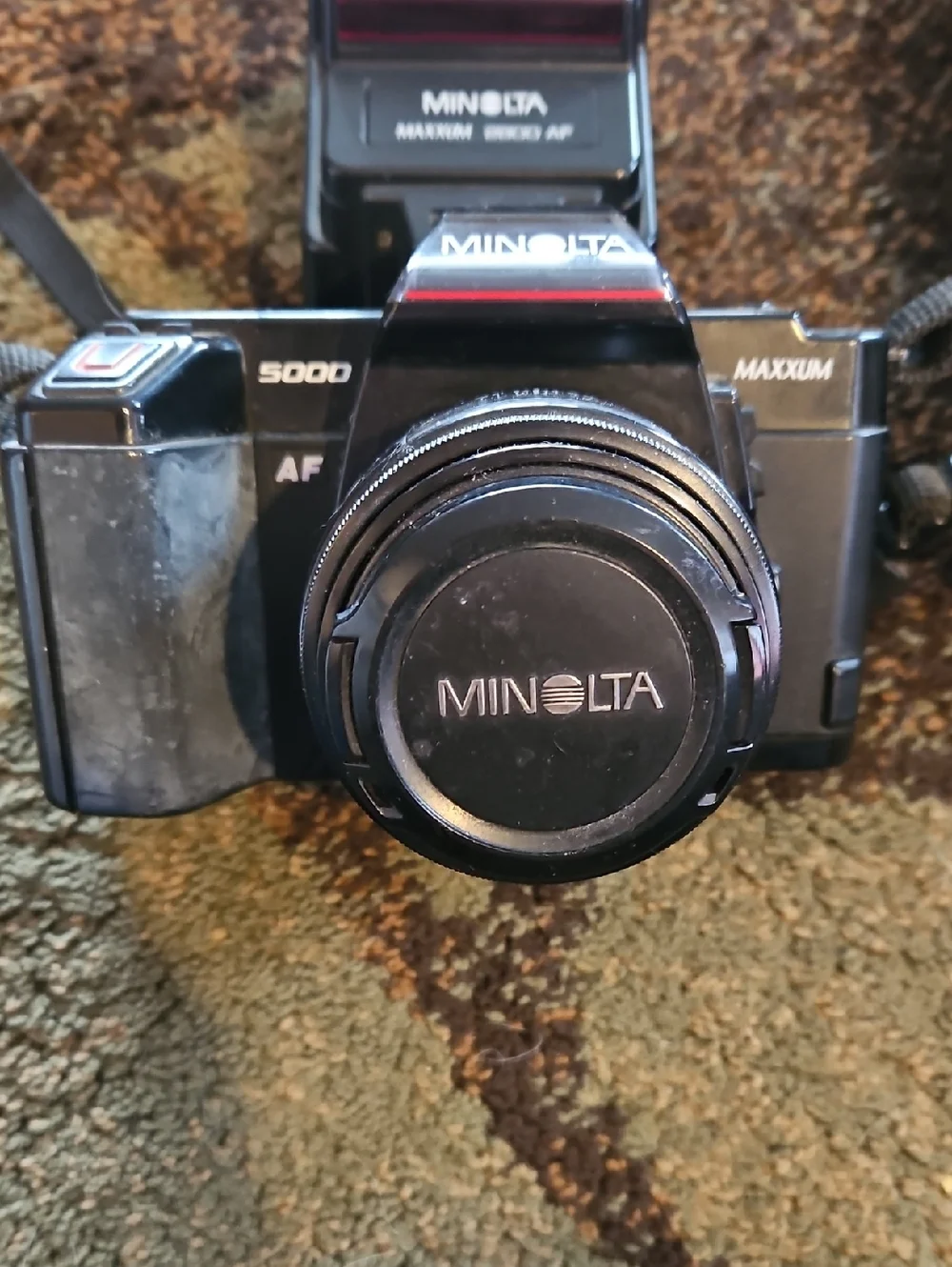 Minolta 35mm Camera With Flash And Telephoto Lense